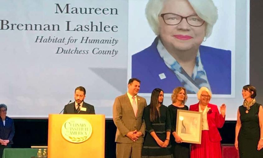 Photo of Maureen Lashlee, Dutchess County CEO receiving an award