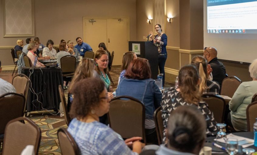 Habitat NYS CEO, Mary Robinson speaking to a room of affiliates at the Summer Symposium