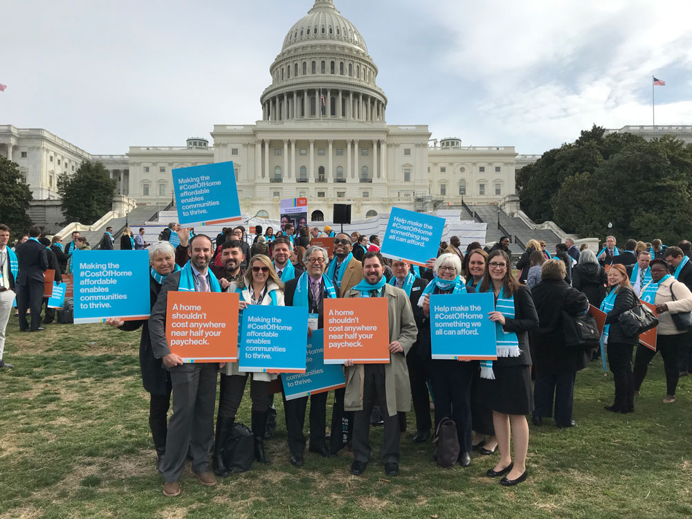 Habitat representatives stand in front of the United States Capitol